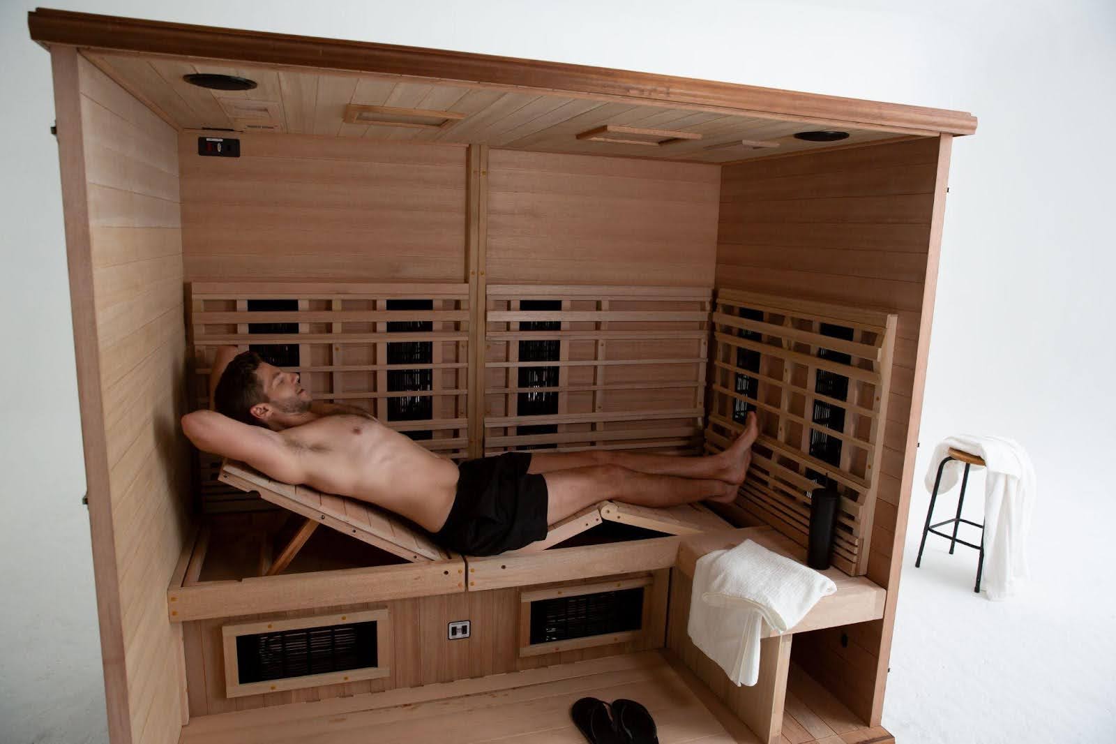 A man enjoying his time in a sauna.